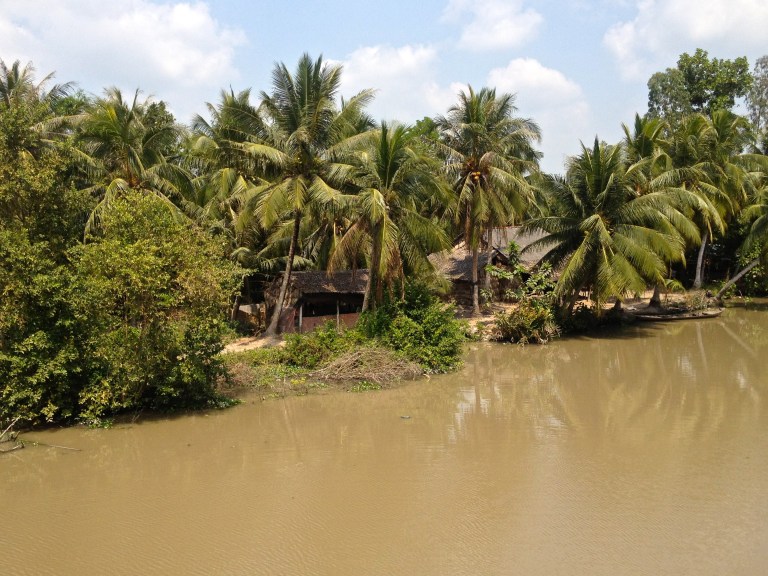 Bamboo homes along the Mekong Delta in Southern Vietnam