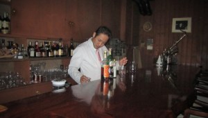 Our bartender at Bar Dolphy meticulously preparing cocktails