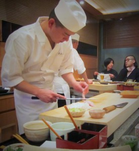 Sushi chef at Kyubei preparing the prawn sushi