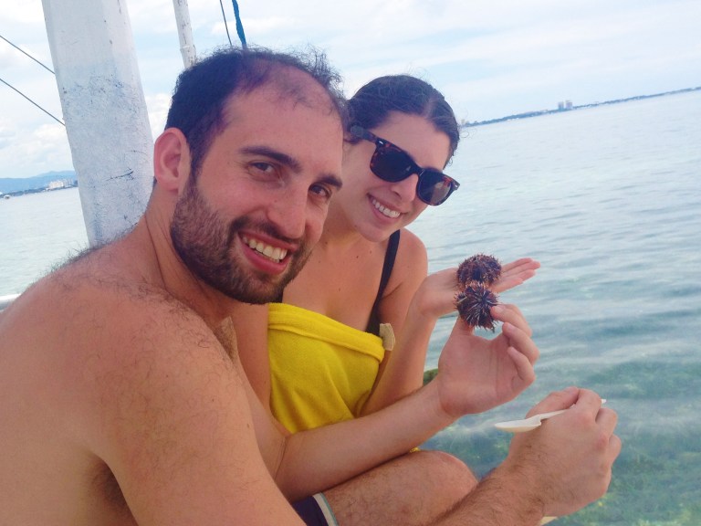 Trying our first fresh water sea urchin, pulled from the sea just minutes before