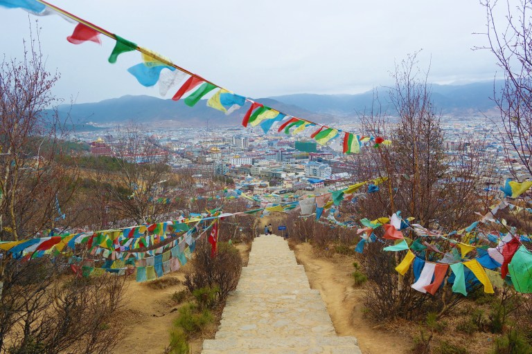 Tibetan prayer flags outside of the Baiji Temple in Shangri-La
