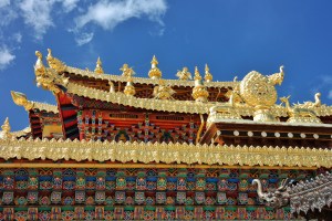 Immaculately decorated gold emblems outside the Songzanlin Monastery, the largest Tibetan Buddhist monastey in Yunnan, China