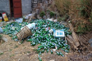 Hundreds of empty beer bottles near a halfway house in Tiger Leaping Gorge