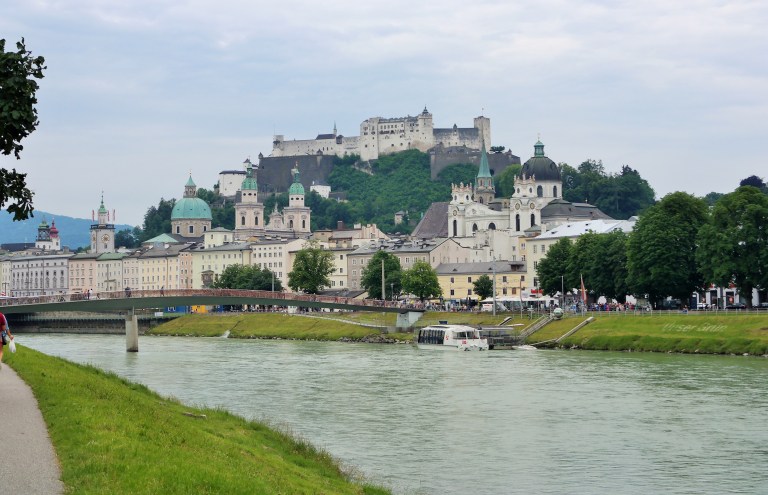 View of Salzburg's baroque architexture and the Hohensalzburg Castle along the Salzach River 